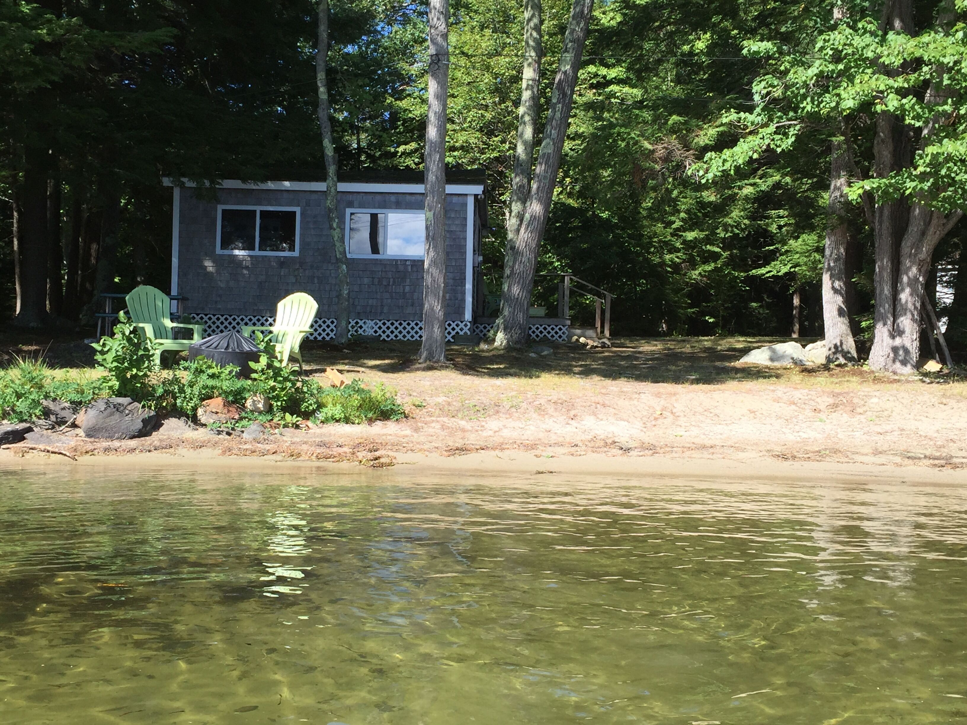 Walk out beach in private cove on Cobboossee Lake 