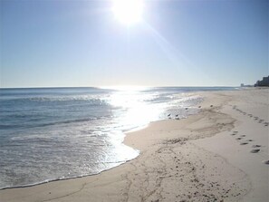On the beach, sun loungers, beach towels