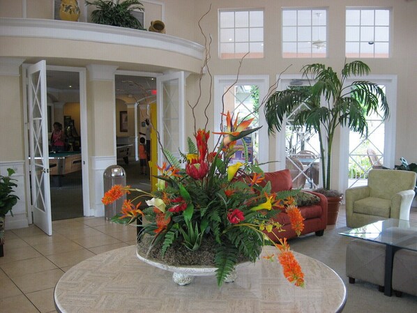 Relax in our welcoming lobby, surrounded by lush greenery and comfortable seating areas.