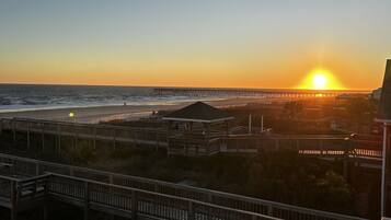 On the beach, sun-loungers