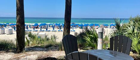 On the beach, sun-loungers