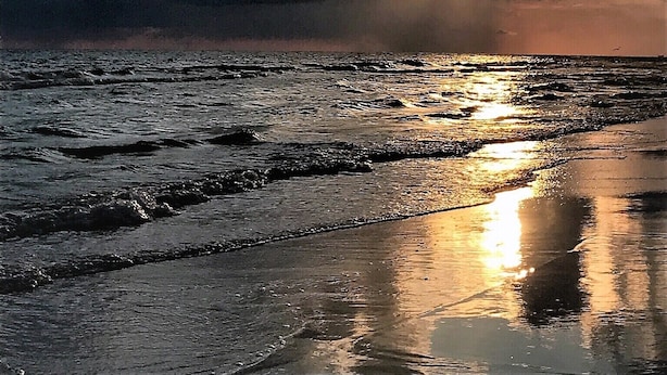 A beach with the sun reflecting on the wet sand, clouds in the sky, and the ocean. - Amazing Location in Beautiful Blue Mountain Beach.  75 Yards from the Sand...   (Santa Rosa Beach)