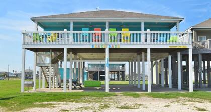 Just steps to the Sand & Surf! Sleeps 12, with 2 Master Suites! Perfect Rental!