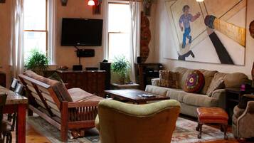 LCD TV, DVD player, video library, stereo