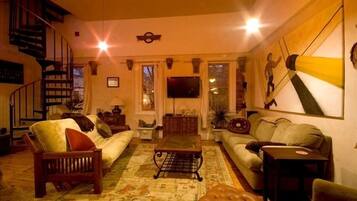 LCD TV, DVD player, video library, stereo