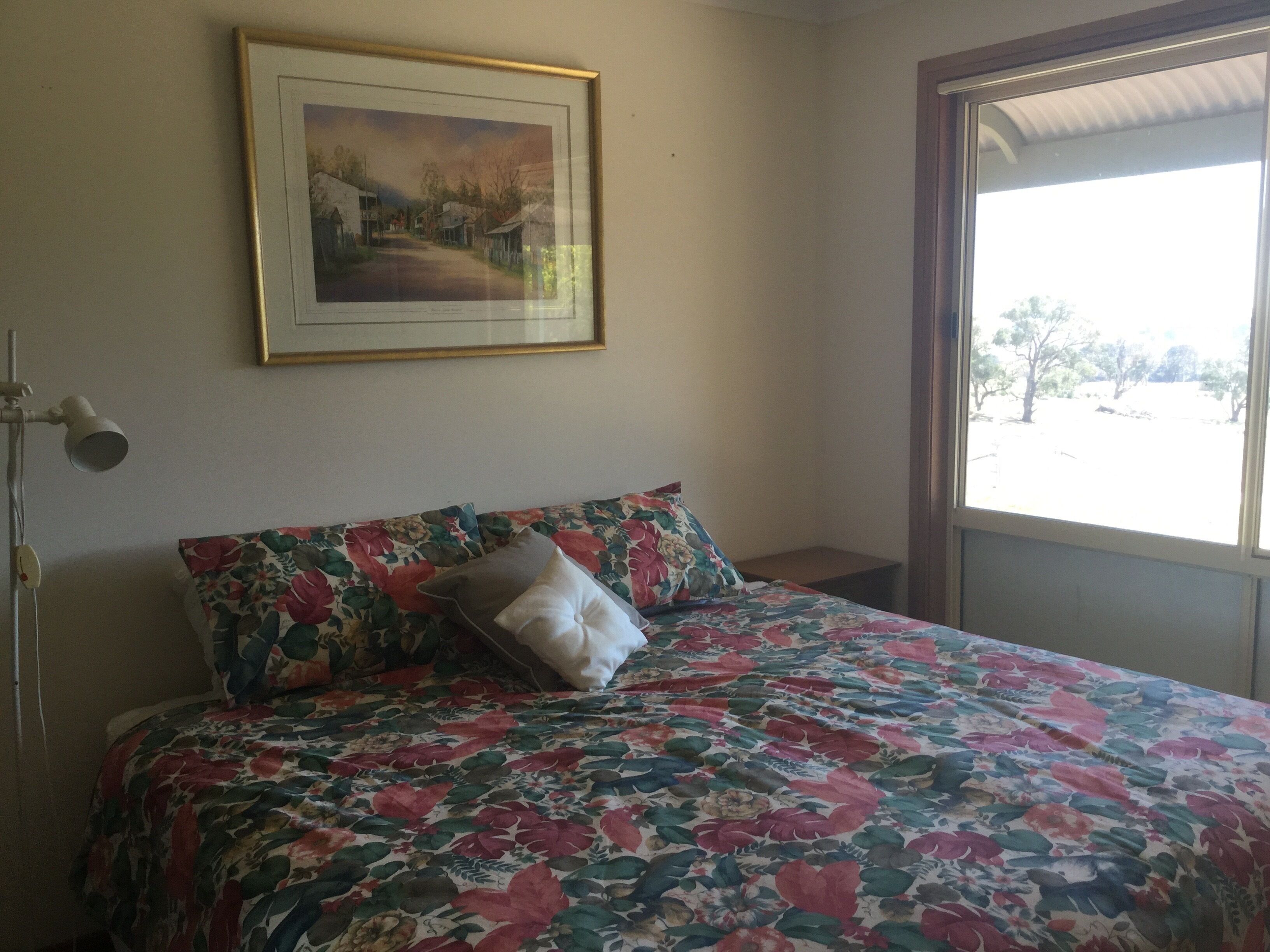 Comfortable homestead on 200 Ac. Working Cattle farm. River and views.