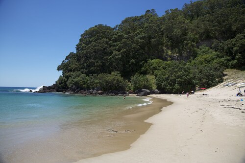 ONEMANA. Premium location. Walk across the road to the beach.