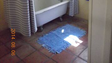 Combined shower/bathtub, hair dryer, towels, soap