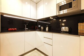 Fridge, microwave, dishwasher, coffee/tea maker