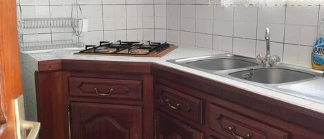 Fridge, stovetop, cookware/dishes/utensils