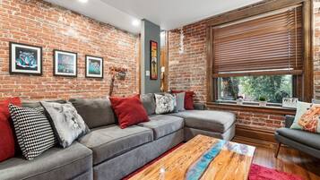 TV, fireplace, books, music library