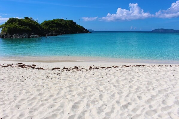 On the beach, sun loungers, beach towels