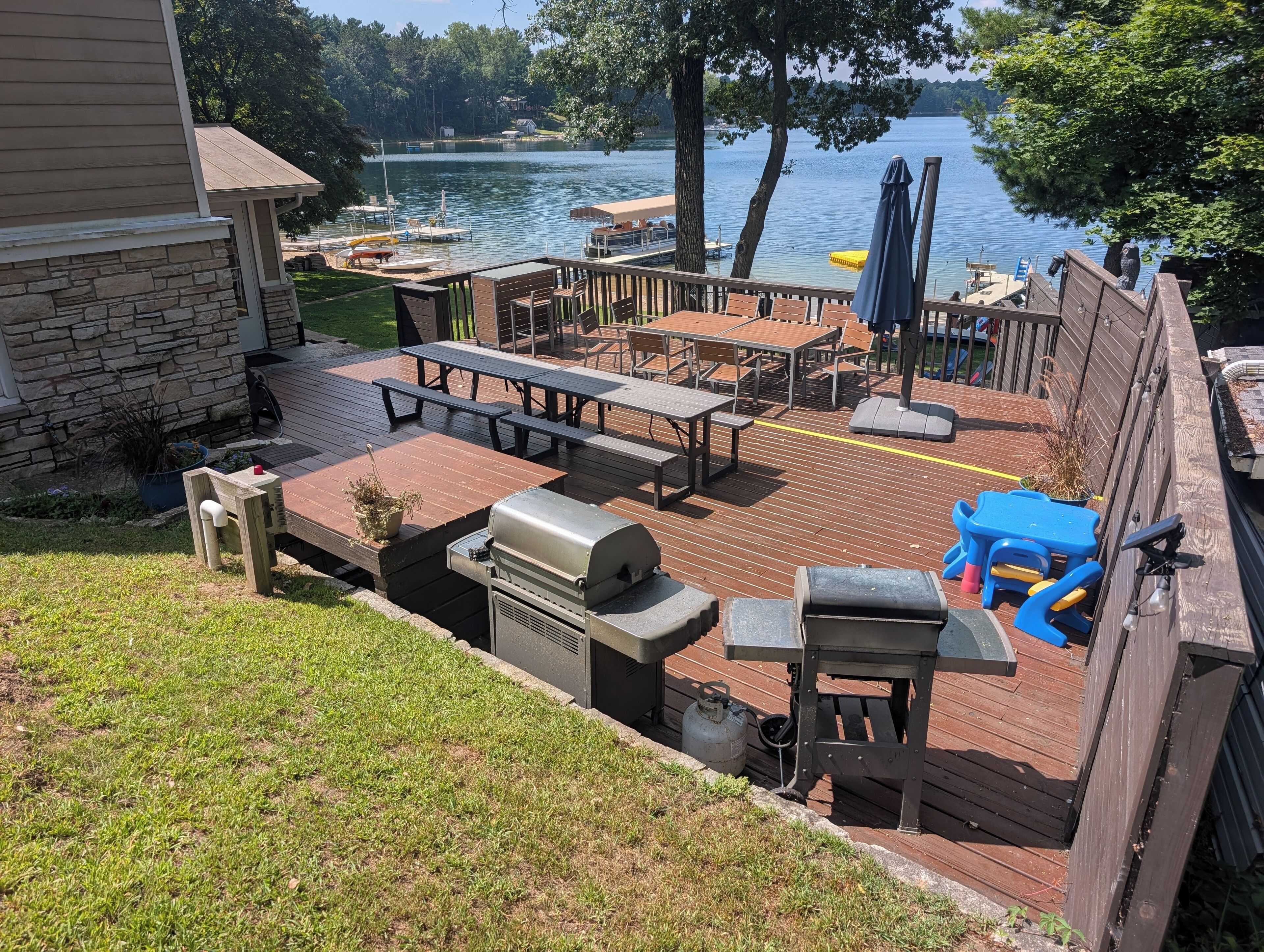 HUGE patio overlooking the water + 2 gas grills!