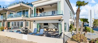 Located directly on the Sand. Two Master Suites, four bedrooms, four bathrooms.
