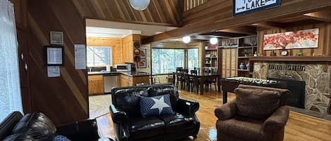 TV, fireplace, table football, books