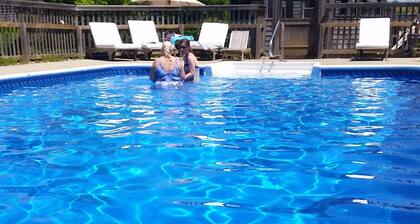 Beautiful home with private heated pool, basketball and large outdoor space.