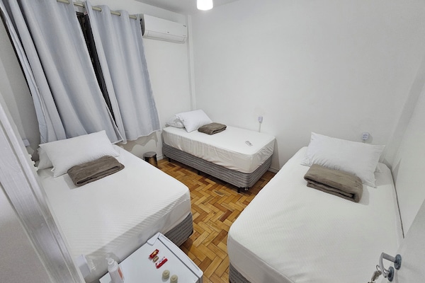 Basic Single Room | Minibar, blackout drapes, iron/ironing board, free WiFi