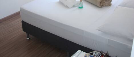 Economy Suite | 1 bedroom, minibar, blackout curtains, iron/ironing board