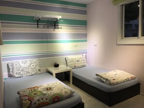 Blackout curtains, rollaway beds, free WiFi, bed sheets