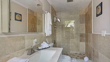 Shower, hair dryer, towels, soap