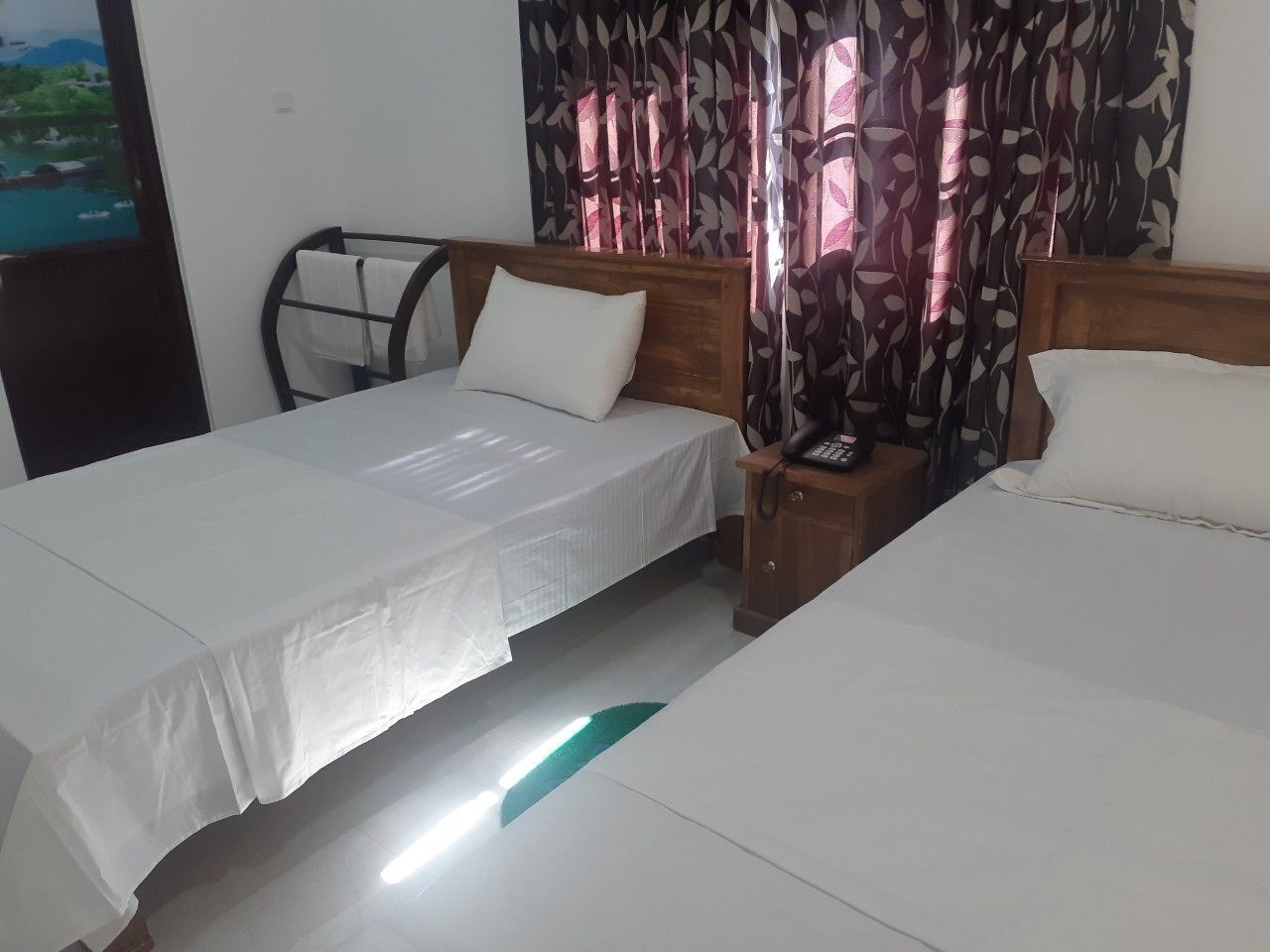 Premium bedding, desk, blackout drapes, soundproofing
