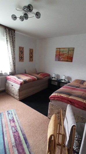 1 chambre, coffres-forts dans les chambres, fer et planche à repasser