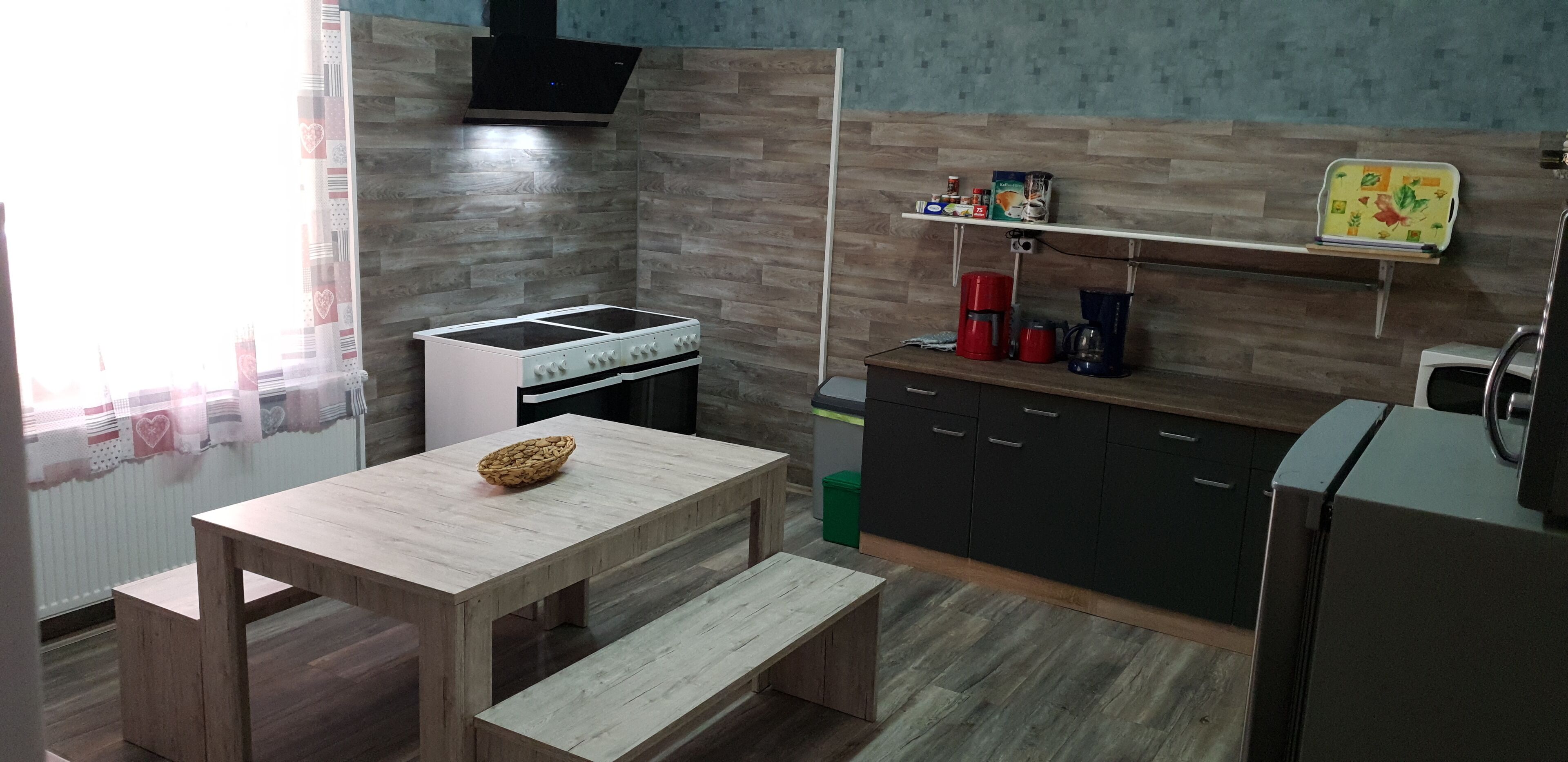 13 bedrooms, 10 bathrooms, living room, dining room and an open kitchen