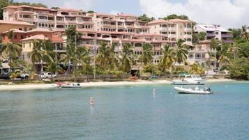 On the beach, sun loungers, beach towels