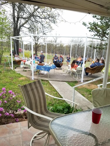 Quiet Country Get Away with big porches, swimming pool, and fishing pond.