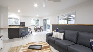 Flat-screen TV, fireplace, video game console, Netflix