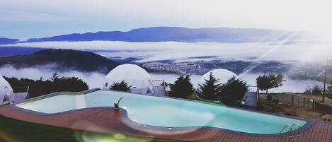 Seasonal outdoor pool, open 8:00 AM to 8:00 PM, sun loungers