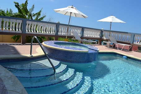 Outdoor pool, a heated pool. Sea View Heights Villa Montego Bay, With the Most Extraordinary View.