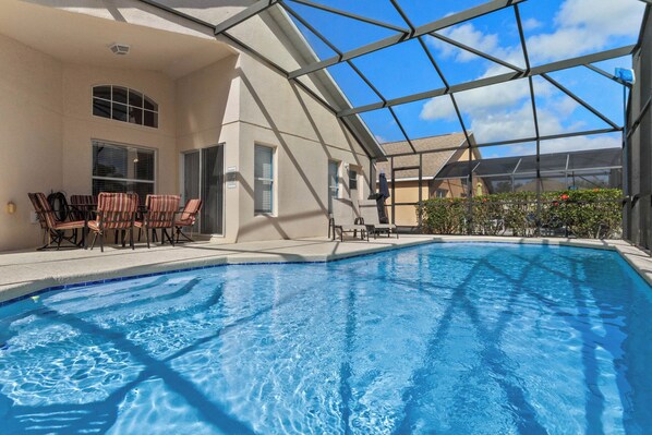 Relax by the pool surrounded by comfortable seating and take in the views through the glass ceiling.