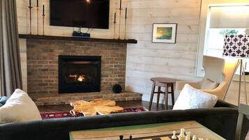 Smart TV, fireplace, books