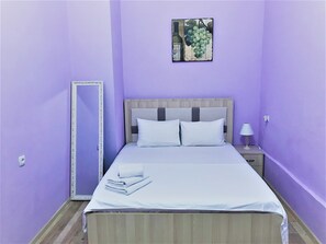 1 غرفة نوم ومكواة/لوح كي وواي فاي وملاءات أسرّة