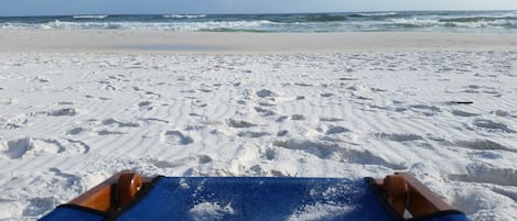 On the beach, sun loungers