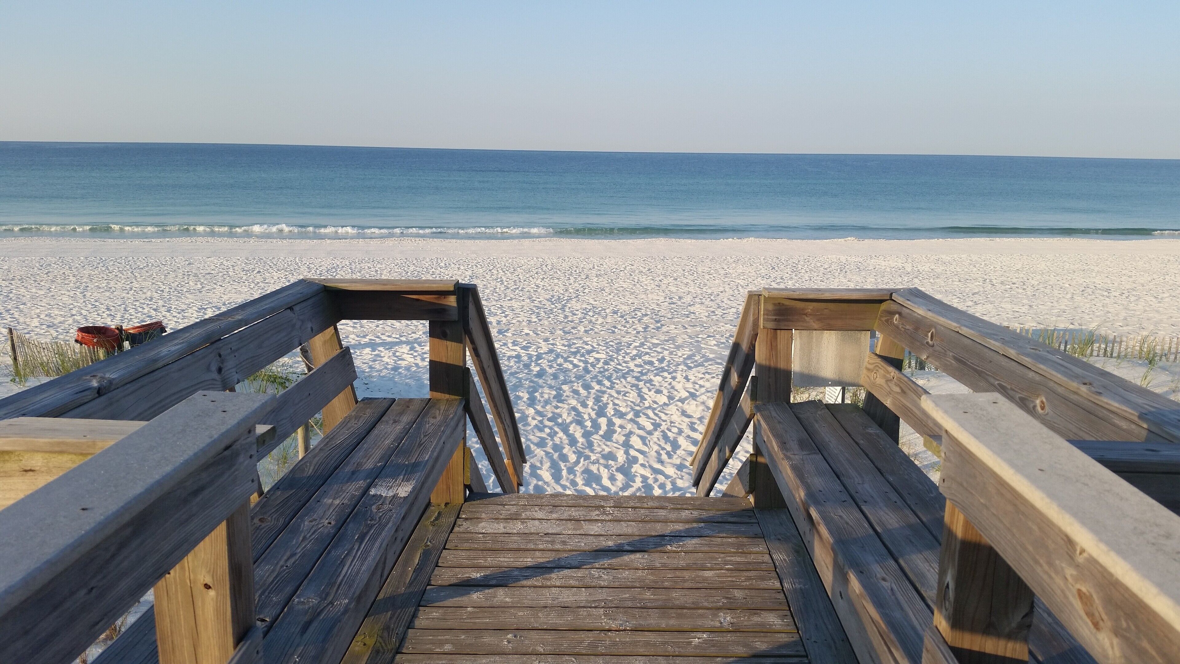 On the beach, sun-loungers