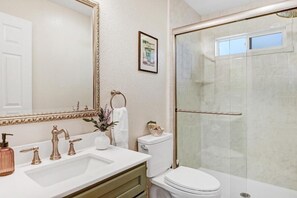 Shower, eco-friendly toiletries, hair dryer, towels