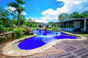 Outdoor pool, open 8:00 AM to 9:00 PM, sun loungers