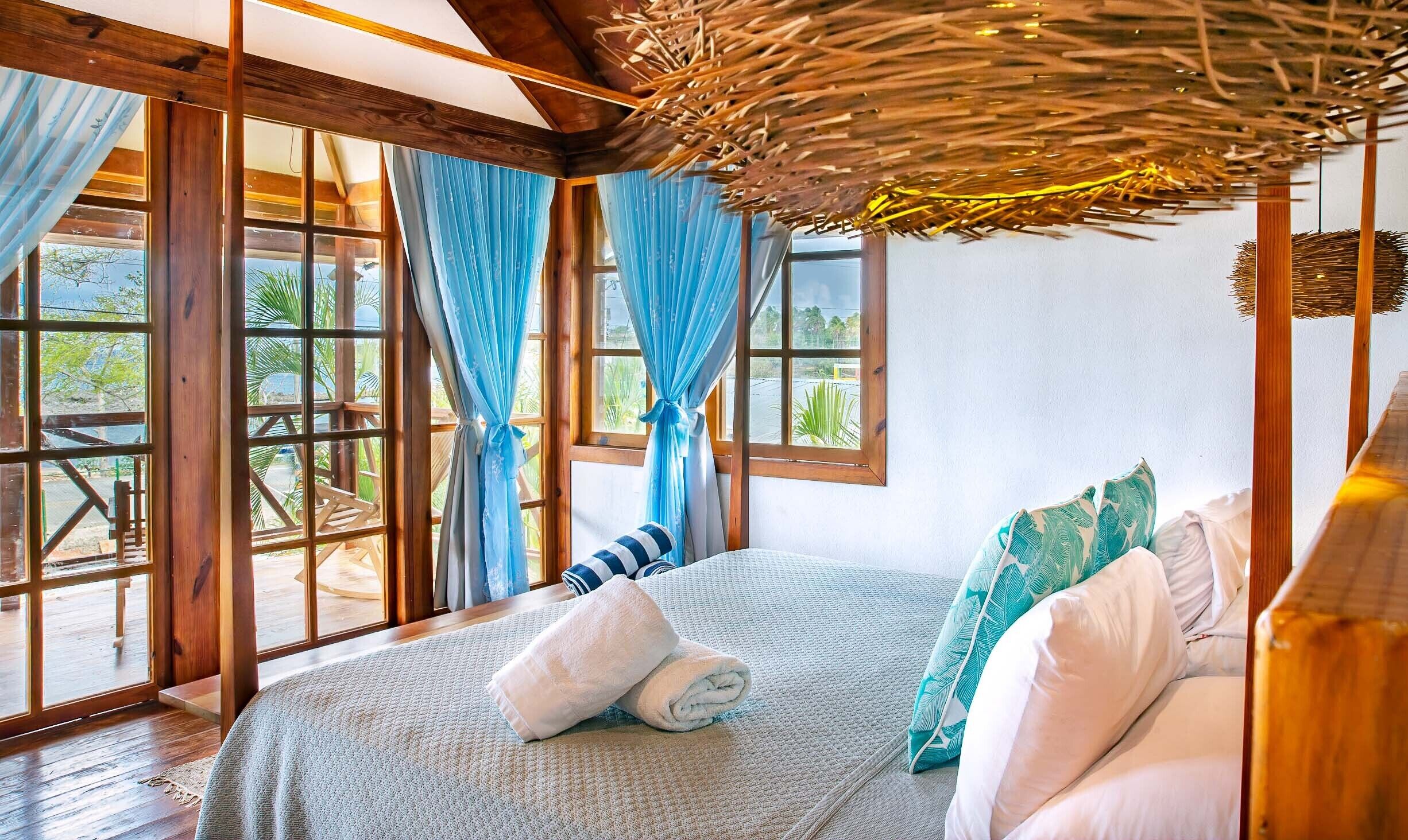 caribbean house ocean front, king size suite | premium bedding, down duvets, pillow-top beds, in-room safe