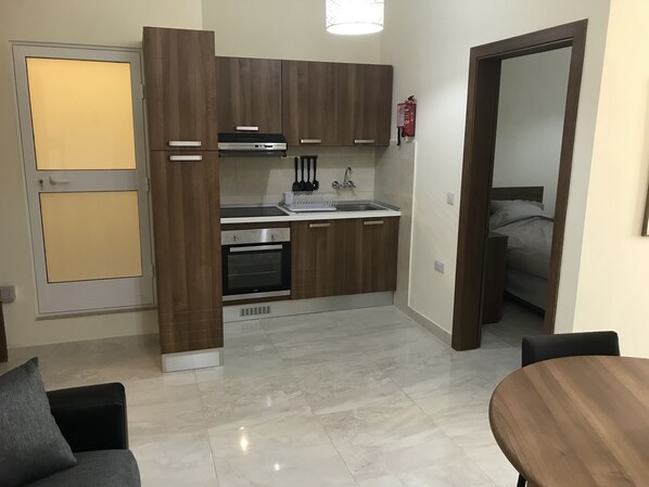 Leilighet, 1 soverom | Eget kjøkken | Kjøleskap, mikrobølgeovn, ovn og kokeplater