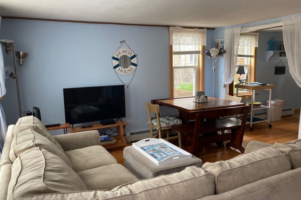 View from entry door: Living area/dining. Kitchen off of living area.