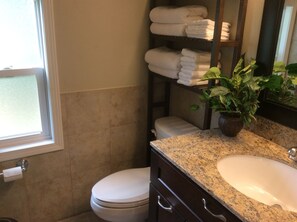 Shower, hair dryer, towels, toilet paper - Midcentury Home with Modern Comfort (Pittsburgh)