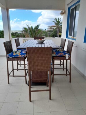 Outdoor dining - Seaside Splendor:  2-3 BR w/ Expansive Deck, Panoramic Views, AC, Wifi, & Pool (Sandy Hill Bay)