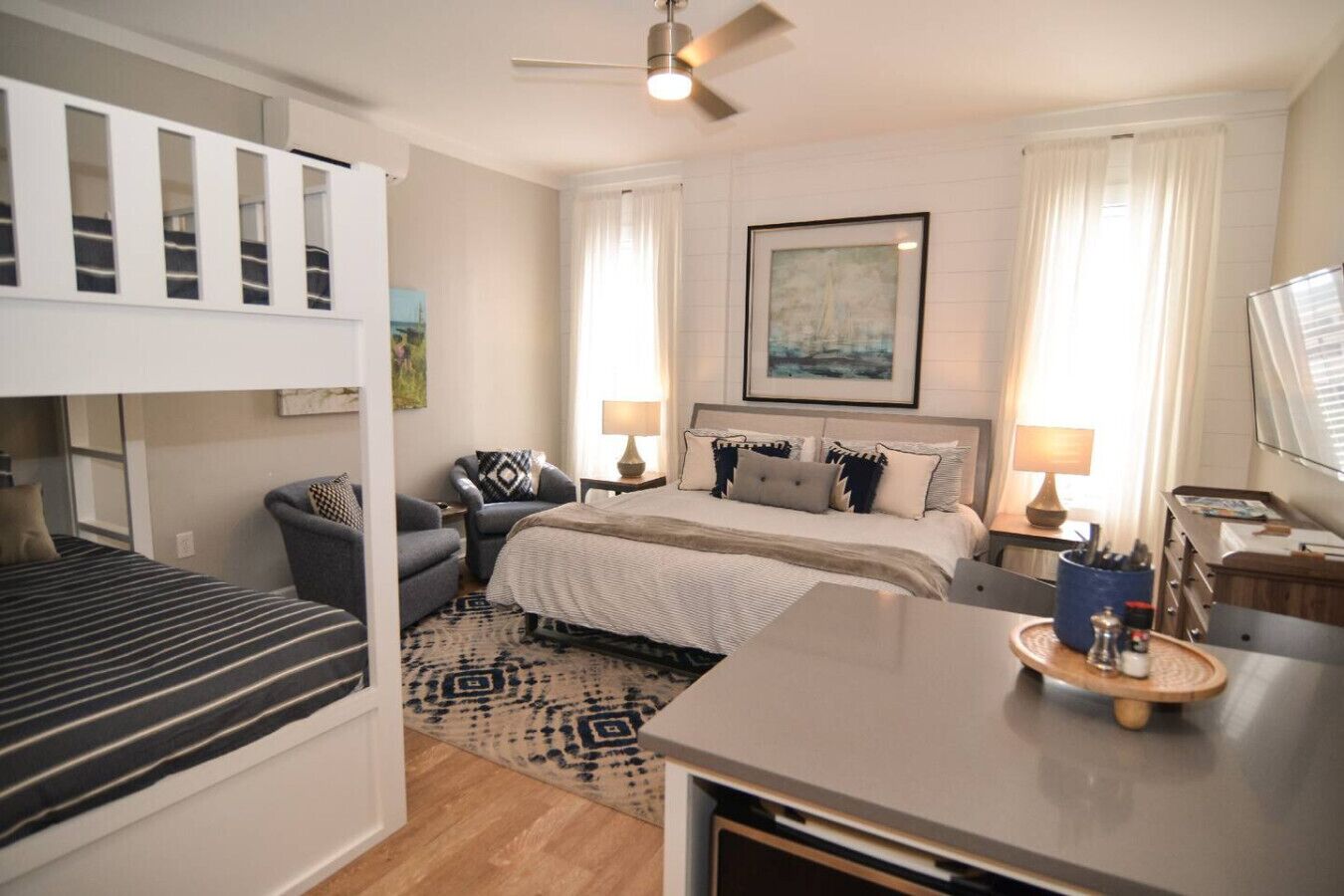 1 bedroom, desk, iron/ironing board, travel crib