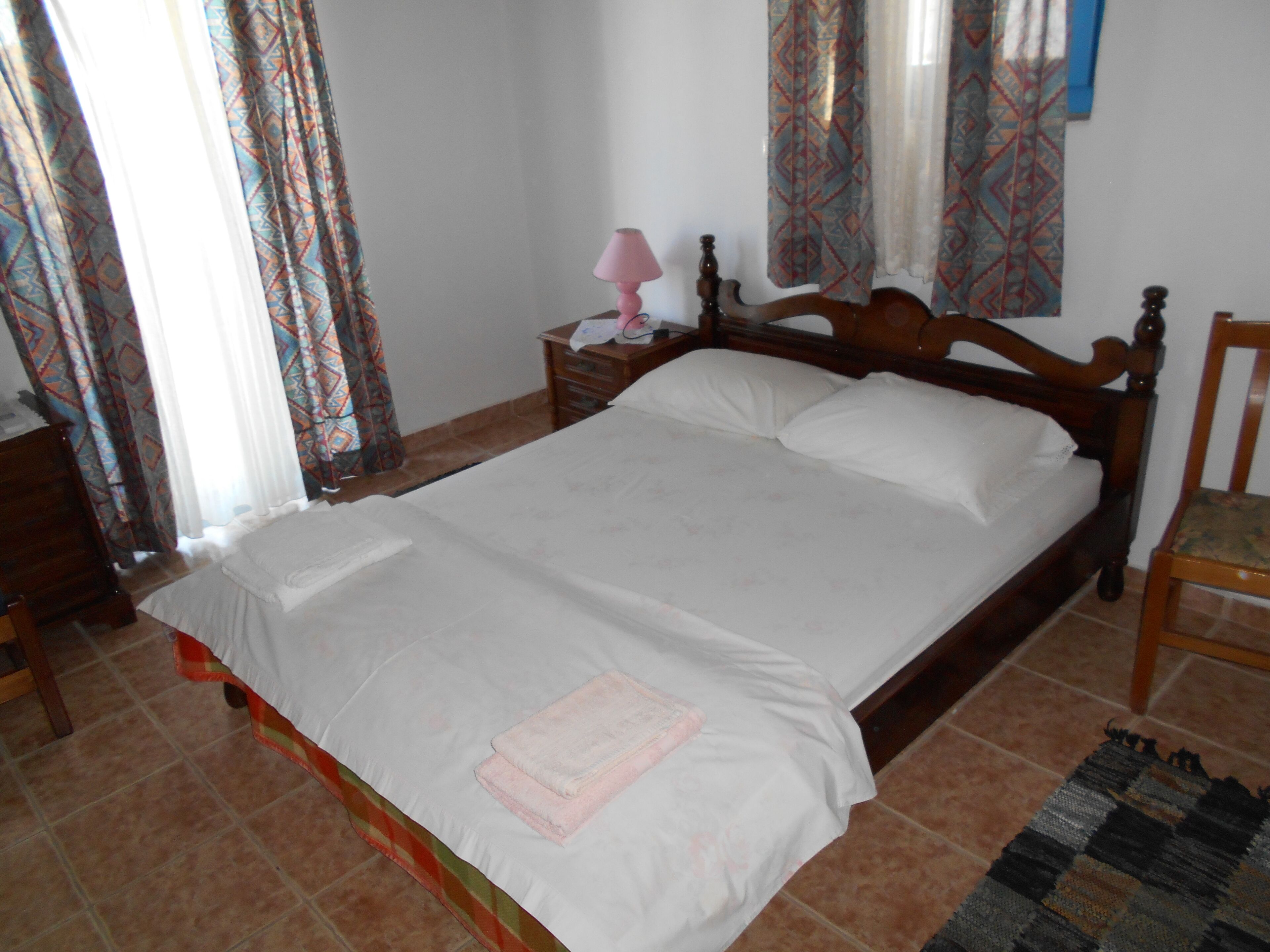 Two storey stone built house by the castle