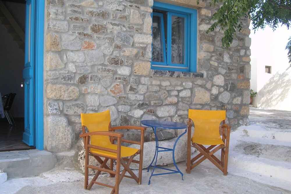 Two storey stone built house by the castle