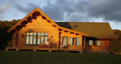 Bellaire Overlook Log Home on Beautiful 40 Acres with sunset views