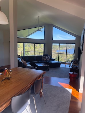 Looking at lake through dining room and lounge room.