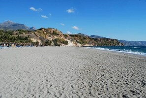 On the beach, beach towels